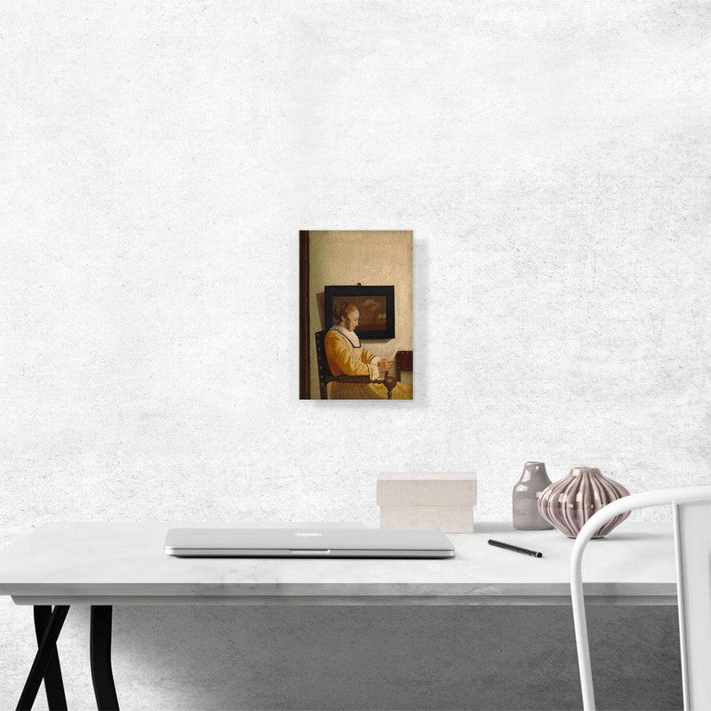 A Young Woman Reading