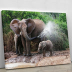 African elephant mother and baby cooling off Canvas Print or Poster